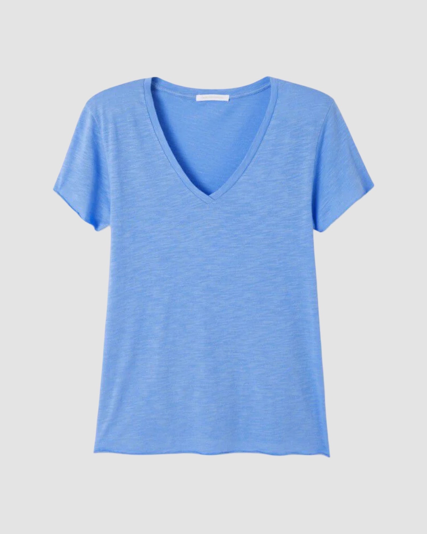 Blue t-shirt on a light gray background