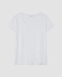 Plain white t-shirt on a light gray background