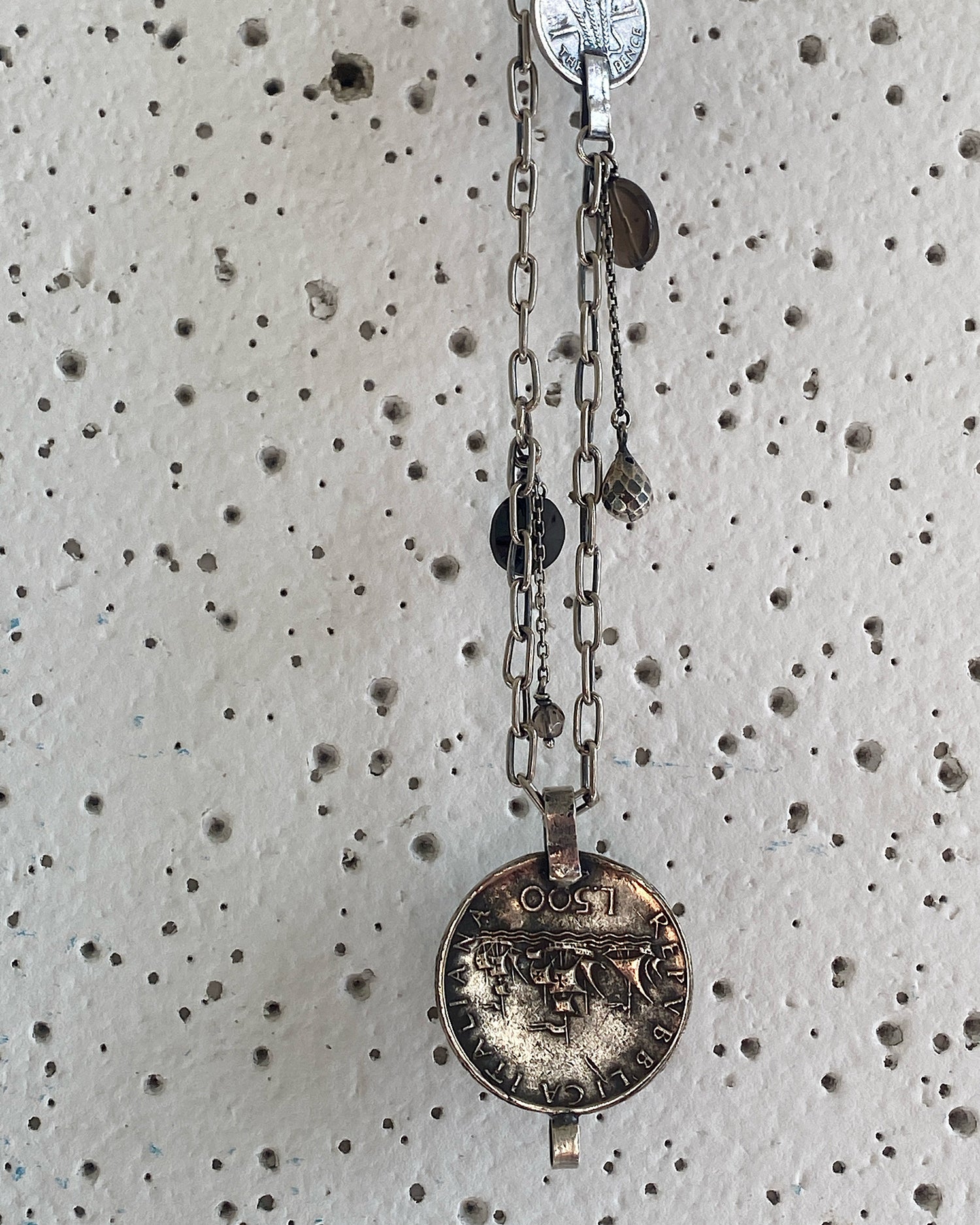 Keita silver handcrafted coin and charm necklace by Johnny Ramli