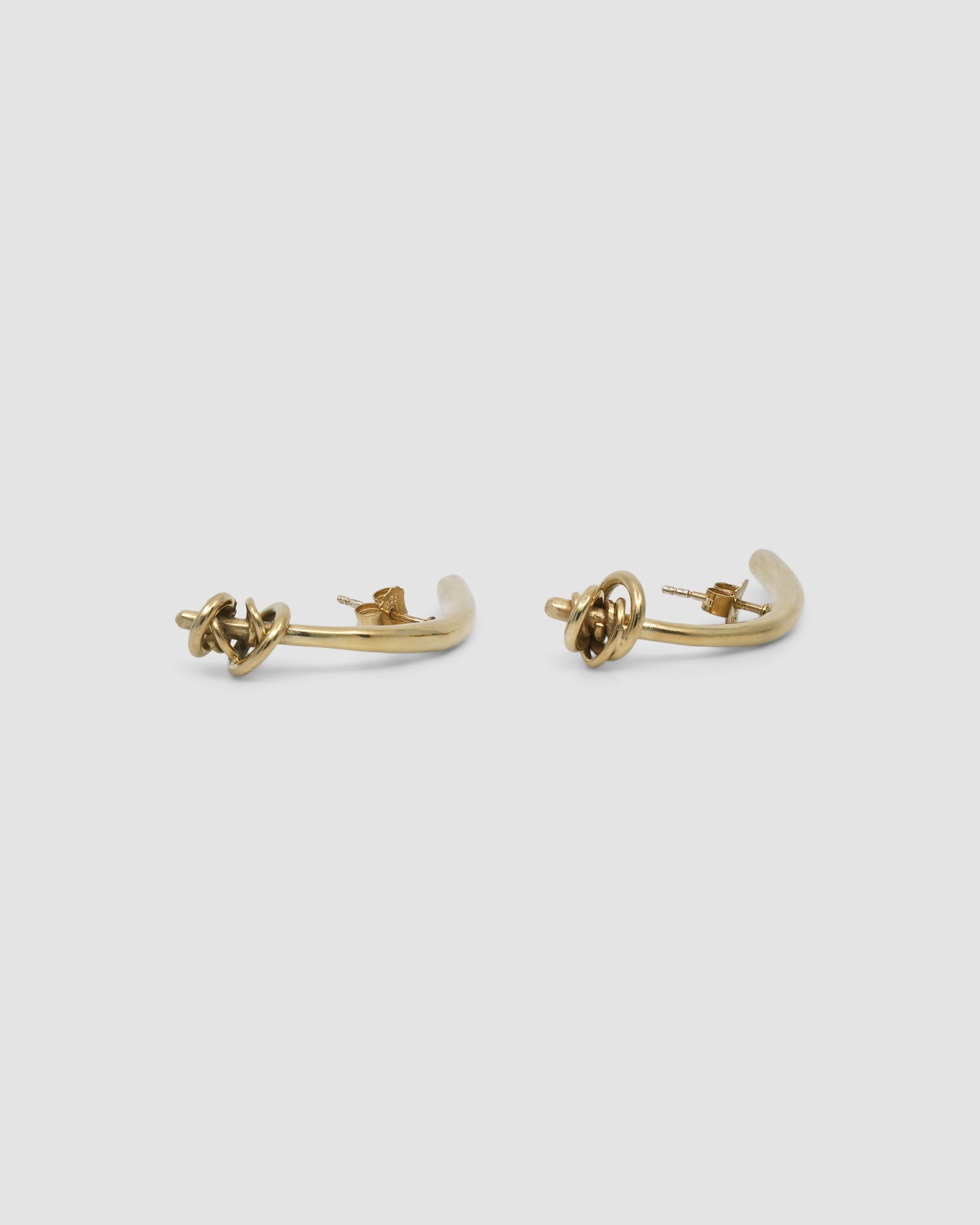 Gold bar curved earrings with ring detail