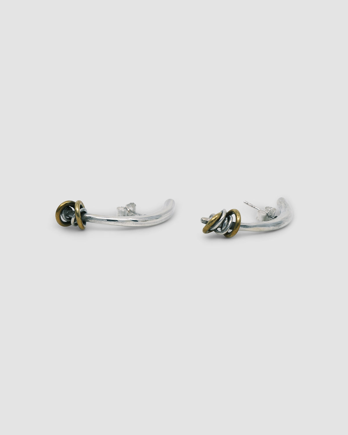 Silver bar curved earrings with mixed metal ring detail