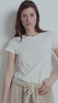 Model wears and American  Vintage white gamipy tshirt