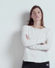 woman wears american vintage boat neck tshirt against a a white background