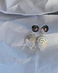 black pearl studs with a silver swirl drop earrings