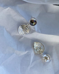 black pearl studs with a silver swirl drop earrings