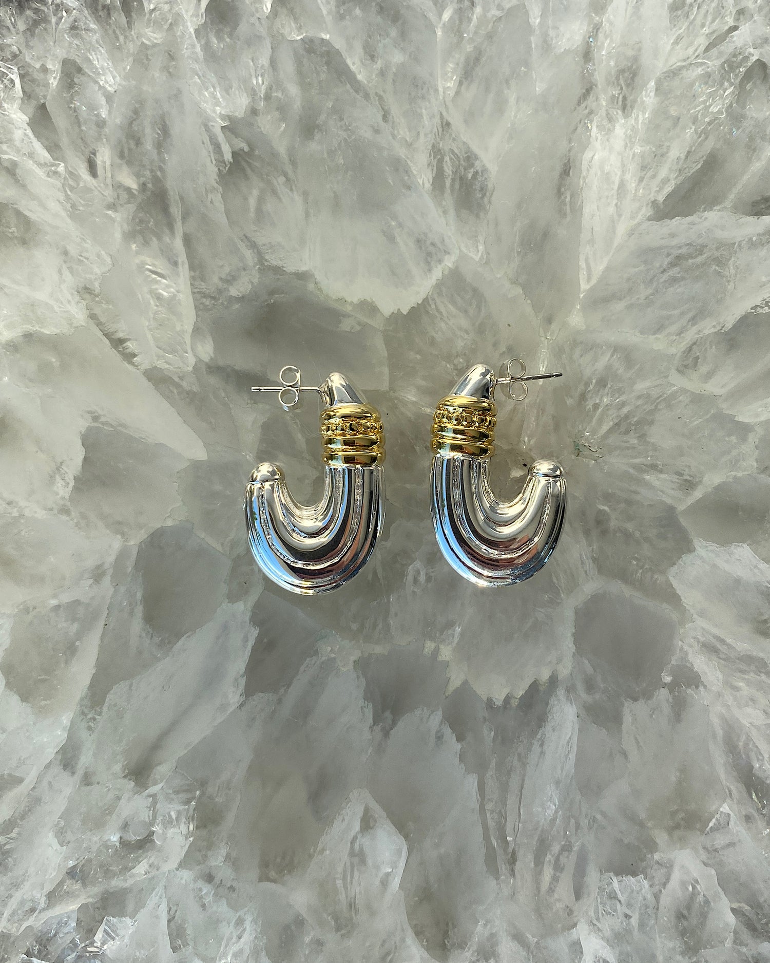 Silver hoop earrings with gold stripes