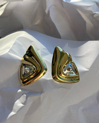 large gold and silver triangle shaped statement earrings with a single pearl stud