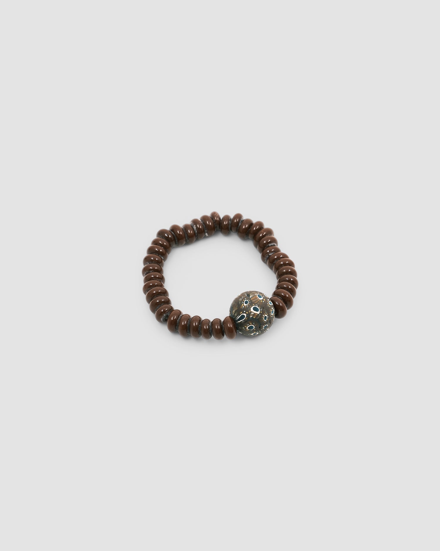 chocolate beaded bracelet with a central dark brown mottled feature bead