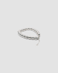 a silver ball bracelet