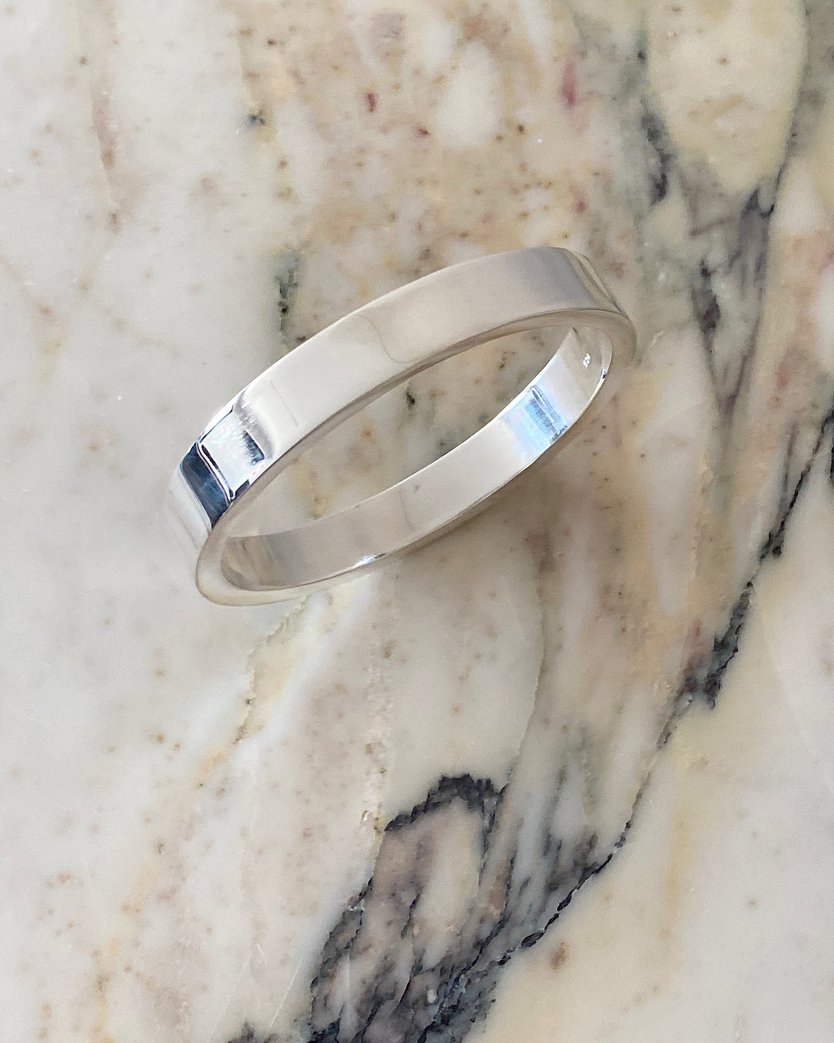 a classic square edged round silver bangle