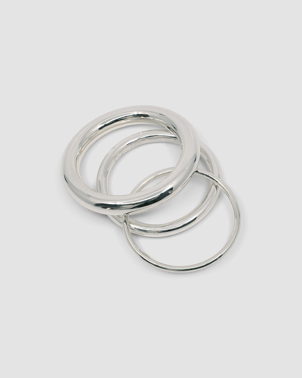 round tube like silver bangles of various sizes