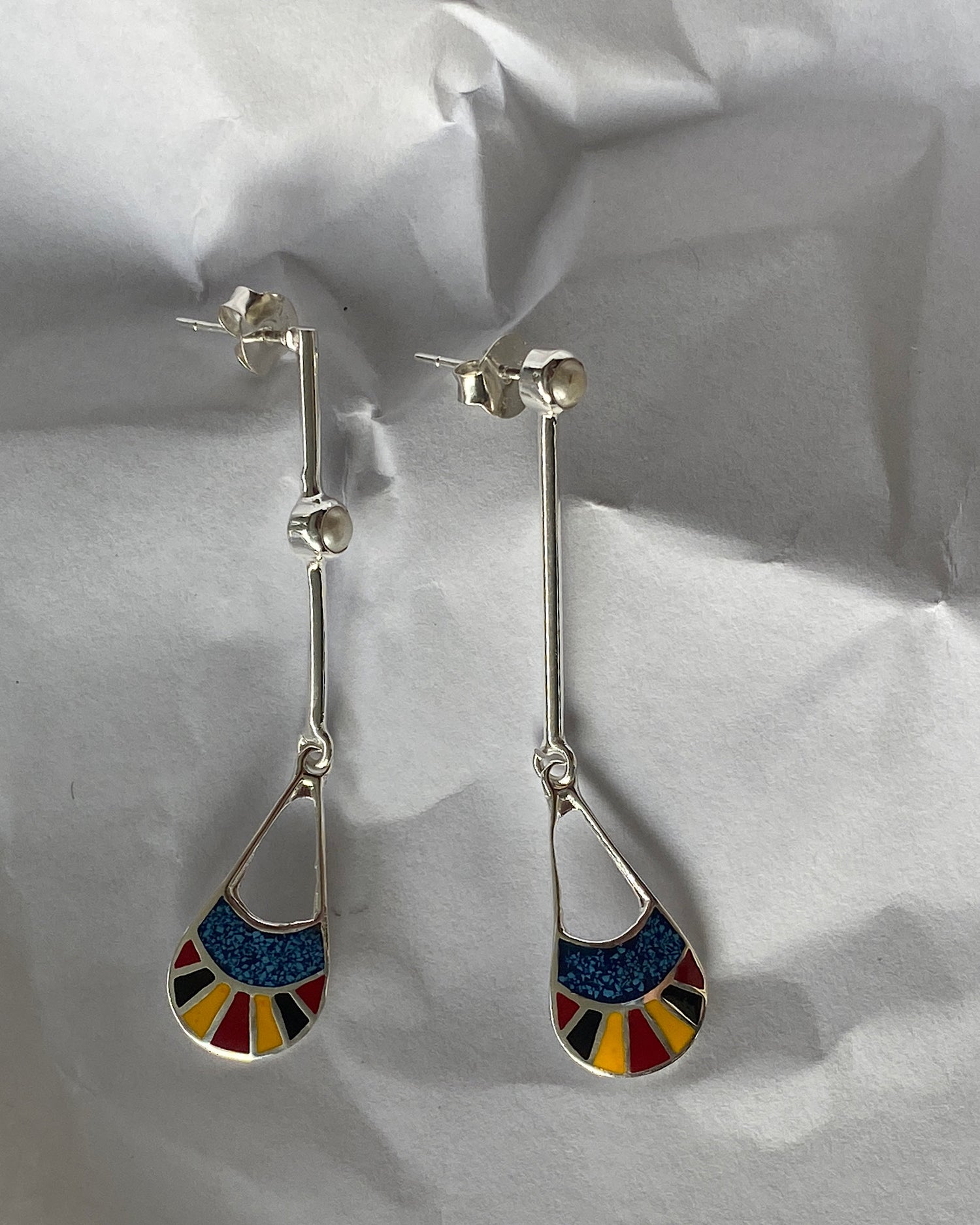 silver drop earrings with red, black & blue and shell drop charms and odd pearls on the drop 