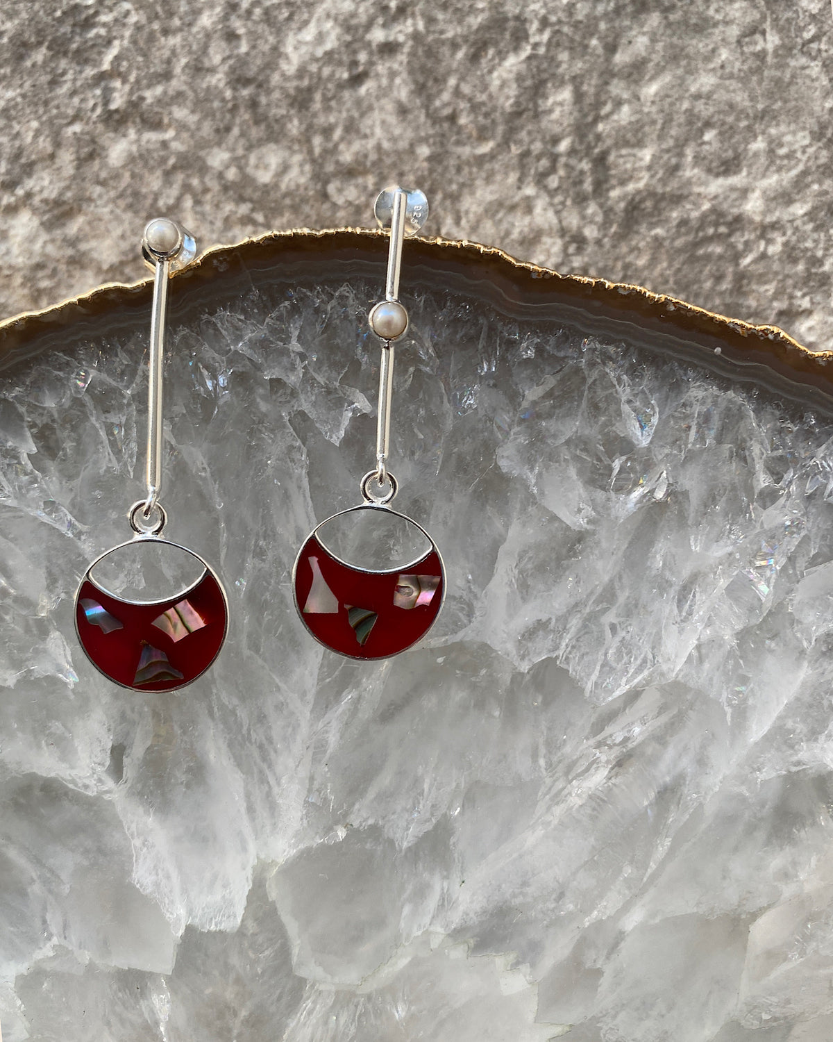 silver drop earrings with red and shell drop charms and odd pearls on the drop